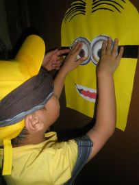 Pin the goggles on the Minion